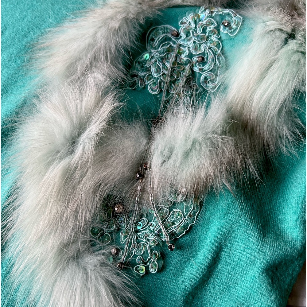 Sweater with embellishment